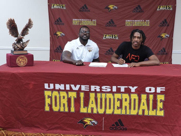 Fort Lauderdale coach Chris Chambers with a signee